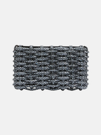 Flat lay of the Morgan Clutch in black tweed by Simkhai with scalloped edges