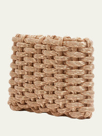 Angled view of the gold SIMKHAI Morgan Clutch showing its dimensional basketweave.