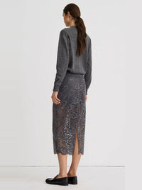 Back view of the SMYTHE Lace Pencil Skirt in Graphite showing the back slit and open lace below the lining.