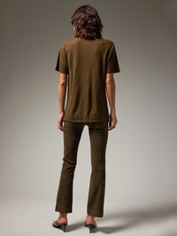 Back view of the Ankle Flare Pant in Loden by SPRWMN, paired with a matching tee