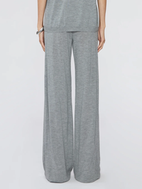 Front view of the Wide Leg Pants in grey by SPRWMN, styled with a matching knit top