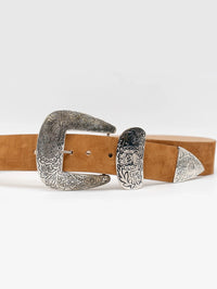 Detail of the engraved silver buckle, keeper and tip on the Streets Ahead Braun Belt in tan suede