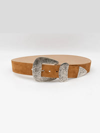 Angled view of the Streets Ahead Braun Belt in tan suede with antique silver hardware
