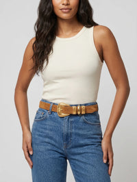 Model wearing the Sienna Belt in tan suede with jeans and a white tank, Streets Ahead