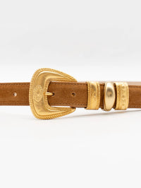 Close-up of the 24k gold-plated buckle and keepers on the Streets Ahead Sienna Belt in tan suede