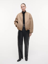 STUDIO AR Etta Faux Fur Bomber Jacket in Olive worn reversed with the smooth side out