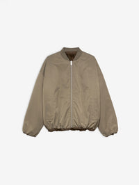 Flat lay of the STUDIO AR Etta Reversible Bomber Jacket in Olive, smooth side out with pockets
