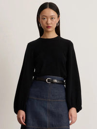 Front view of the Tanya Taylor Marina Cashmere Sweater in black with a crew neck and balloon sleeves.
