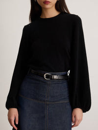 Close up of the black Tanya Taylor Marina Cashmere Sweater showing the soft cashmere knit and crew neck.
