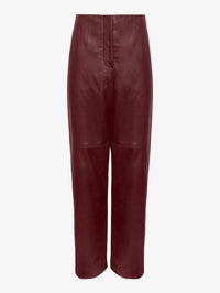 Product front view of the Tanya Taylor Weston Leather Pant in Mahogany lamb leather with knee seams.