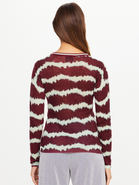 Back view of the Rio Eli Long Sleeve Knit in Tie Dye Rio by THE UPSIDE with wavy horizontal stripes