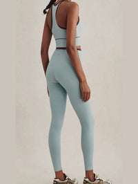 Full-length back view of the Varley Always Contrast High Rise Legging 25 in Tourmaline