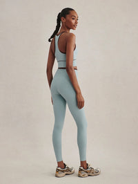 Full-length back view of the Varley Always Jay Bra in Tourmaline with the racerback