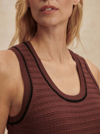 Close-up of the ribbed texture and racerback straps on the Gideon Knit Tank in Ironwood by VARLEY