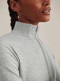 Detail of the rib-knit collar on the Varley Rufus Cropped Zip-Through Sweat in Blue Green Marl