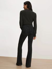Back full-length view of the Veronica Beard Beverly Embroidered Skinny-Flare Jean in Washed Onyx