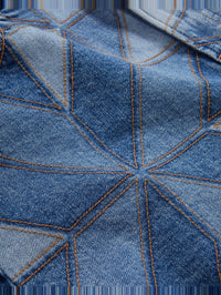 Close-up of quilted denim patches with tan topstitching on the Elijah Short in Prism Blue by Veronica Beard