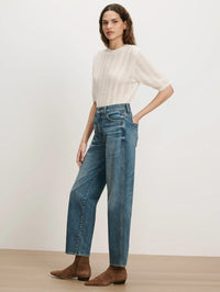 Side view of the Veronica Beard Harley Arc-Leg Jean in Memory Lane showing the curved leg