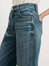 Detail of the front pocket and side seam stitching on the Veronica Beard Harley Arc-Leg Jean in Memory Lane