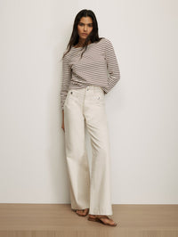Front view of the Hovey Top in Dove by Veronica Beard, stripe detail, styled with white denim