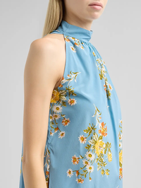 Side view of the Kovi Floral Silk-Blend Top in Blue River Multi by Veronica Beard with botanical print