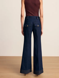 Back view of the Veronica Beard Lancelor Pant in Midnight Wash with contrast stitching and full-length wide leg.