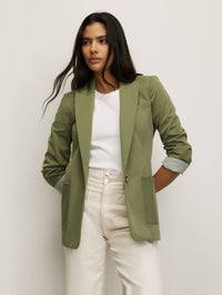 Front view of the McCallen Dickey Jacket in Stone Army by Veronica Beard, styled with a white tee