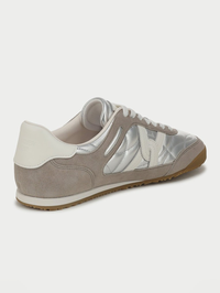 Side view of the Natalia Sneaker in silver and grey by Veronica Beard with gum sole