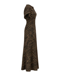 Side view of the flowing ankle-length Veronica Beard Redgrave Dress in Ochre/Black print.