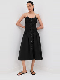 Front view of the Serenel Dress in black by Veronica Beard with button-front detailing and smocked bodice