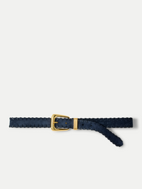 Flat lay of the Suede Whipstitch Arch Belt in navy with gold buckle by Veronica Beard