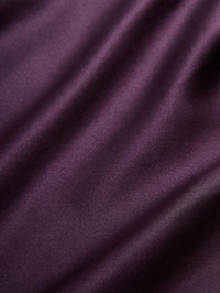 Fabric detail of the Veronica Beard Tam Top in Dark Eggplant showing the silk blend satin sheen