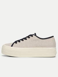 Side view of the Truett Platform Sneaker in sand and navy by Veronica Beard with cream rubber sole