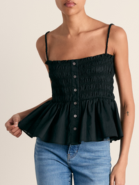 Front view of the Tullia Top in black by Veronica Beard with smocked bodice and button-front detail