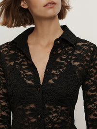 Detail of the sharp collar and button placket on the Veronica Beard Wittaker Lace Shirt in Black.