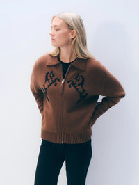 Front view of the White & Warren Cashmere Blend Embroidered Horse Bomber in Umber/Black on a model.