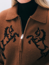 Close-up of the hand-embroidered horse manes on the White & Warren Cashmere Blend Bomber in Umber/Black.