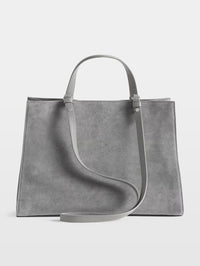 Back view of the Zadig & Voltaire Jack Suede Bag in Road grey showing the plain suede panel and draped leather strap.
