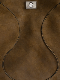 Flat lay of the Jack Suede Bag in wood by ZADIG & VOLTAIRE, showing curved seam details